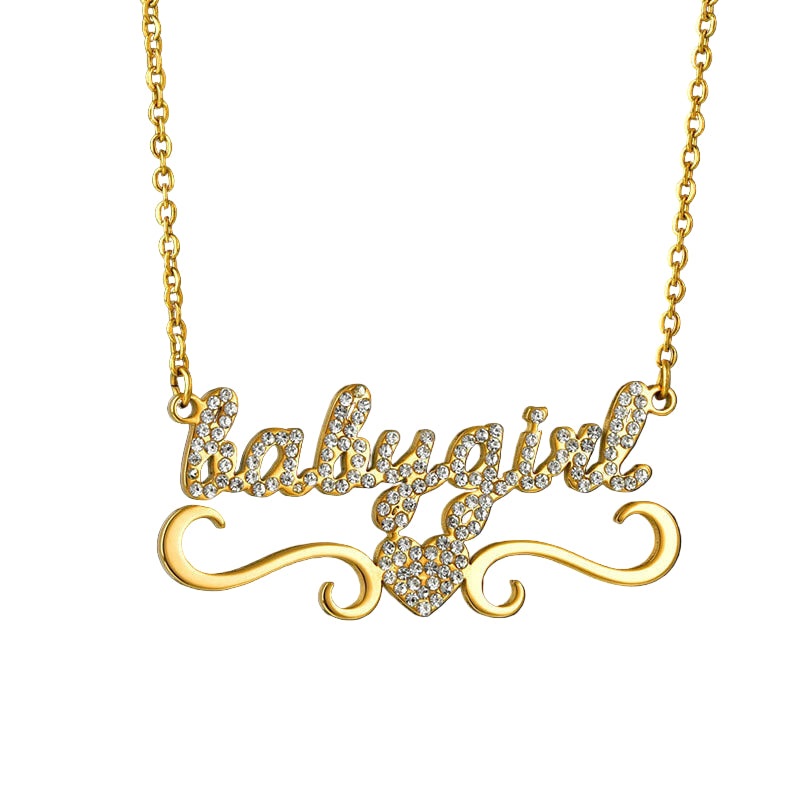 Gold necklace with 'baby girl' pendant on a black background